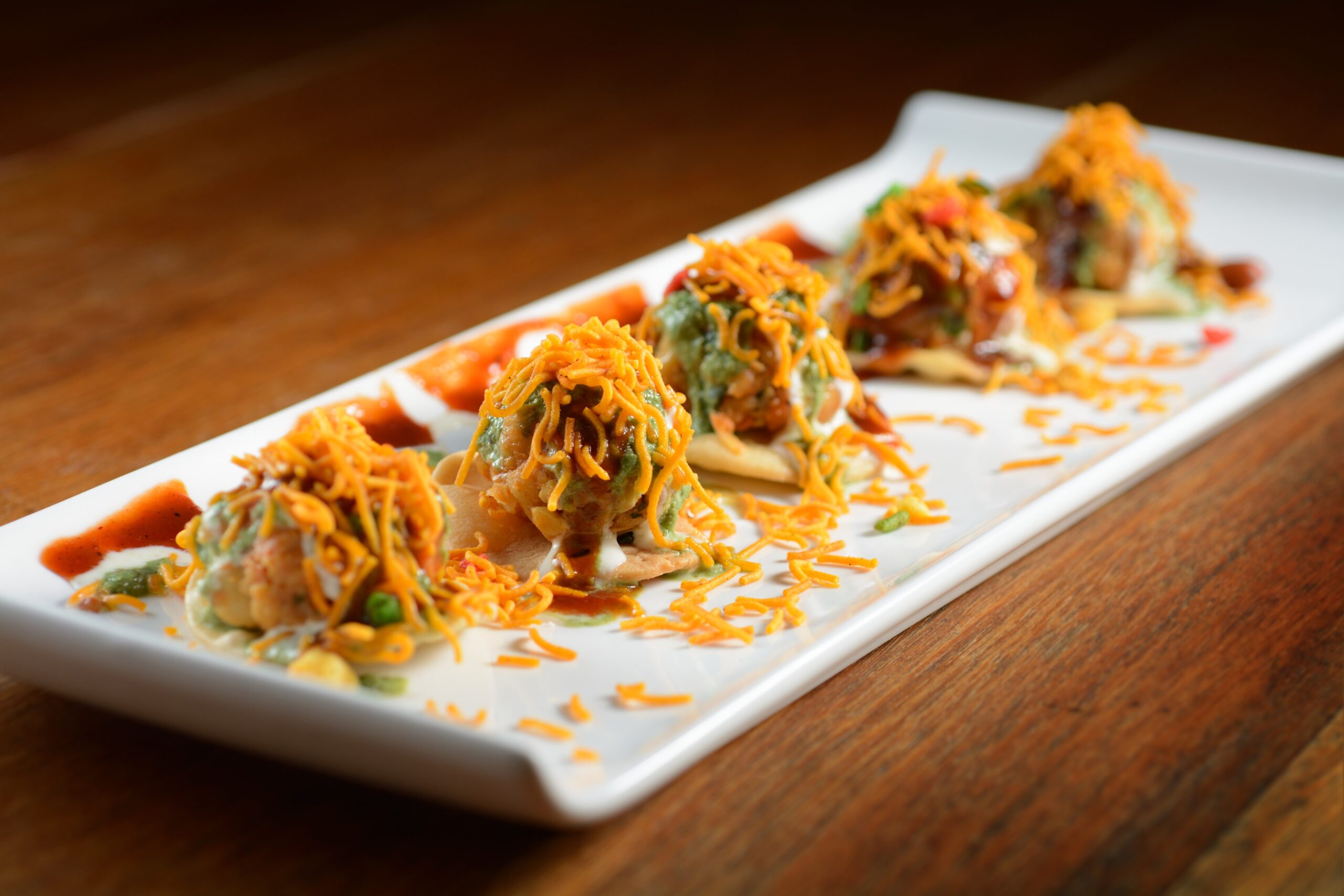 Tandoori chicken platter with naan bread and mint chutney